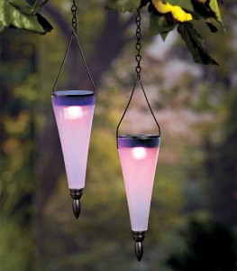 The cool shape of this Set of 2 Color-Changing Solar Lanterns gives your yard a modern look while casting a rainbow of colors in the darkness. 