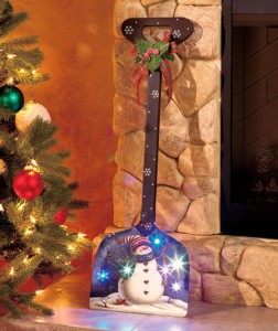 Decorative Lighted Snowman Shovel is a whimsical addition to your holiday setting.
