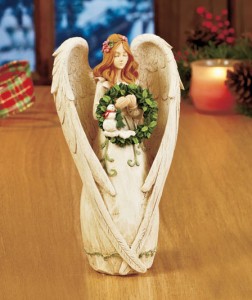 Seasonal Angel Figurine graces your decor with a lovely look for any time of year.