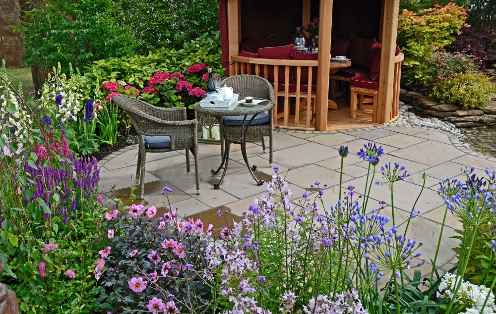 Summer Patio With Plants And Flowers