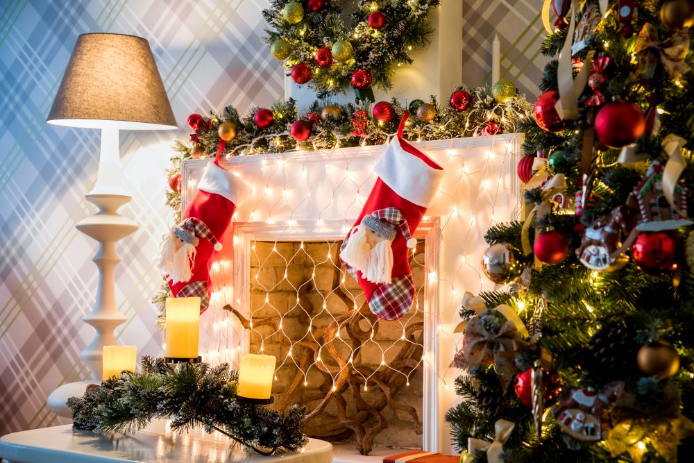 Christmas tree and string lights on mantel