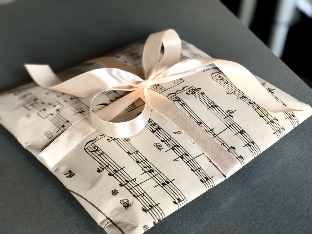 Christmas Gift Wrapping Ideas - themed wrapping paper